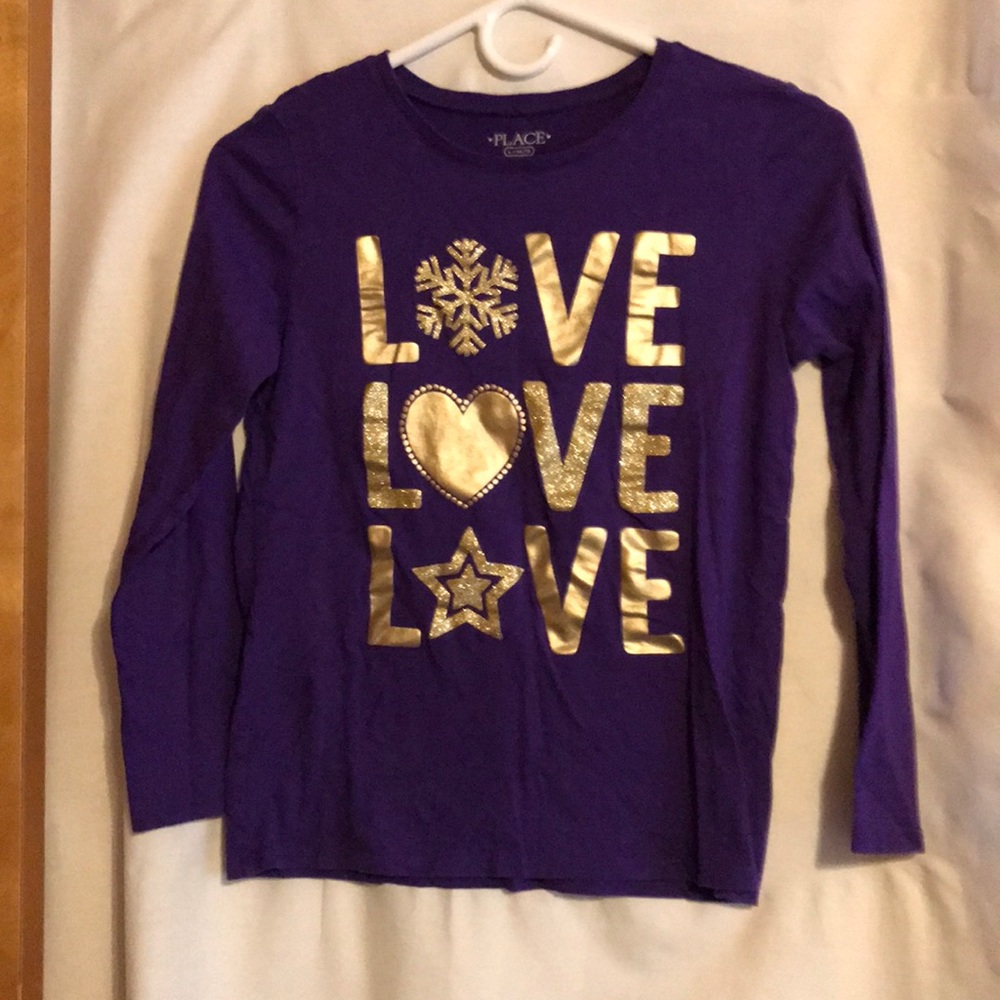 Like new girls purple shirt with application
